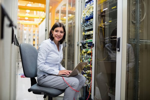 lady in Data Center using structured cabling